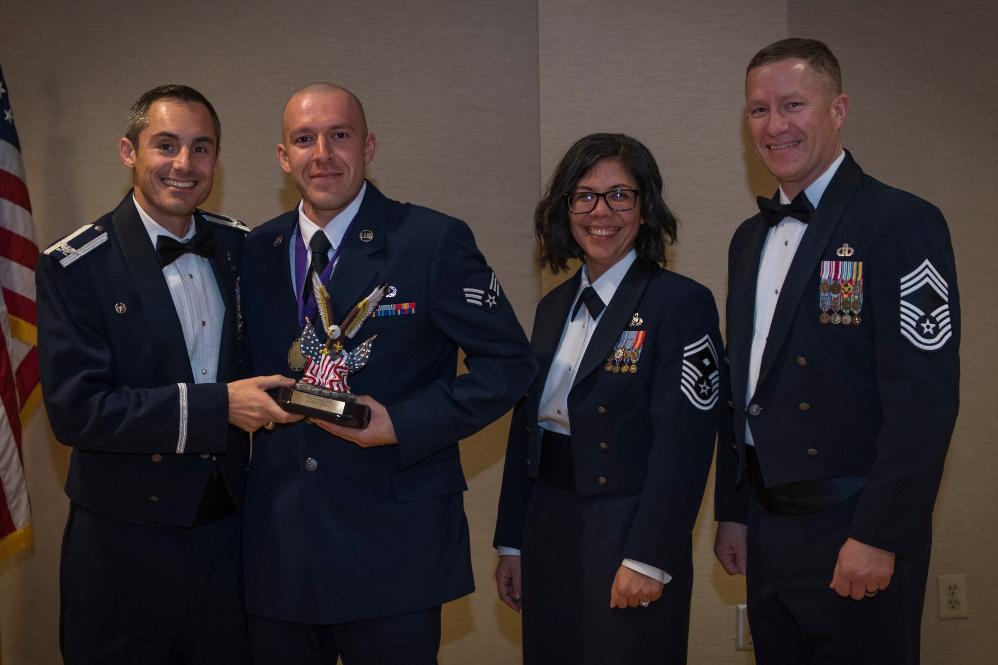 Airmen recieve awards from Airman Leadership School (ALS), Feb. 7, 2019, at Moody Air Force Base, Ga. ALS is a the 5-week course designed to develop Airmen into effective front-line supervisors by focusing on building leadership abilities, teamwork skills and effective communication. (U.S. Air Force photo by Airman Taryn Butler)