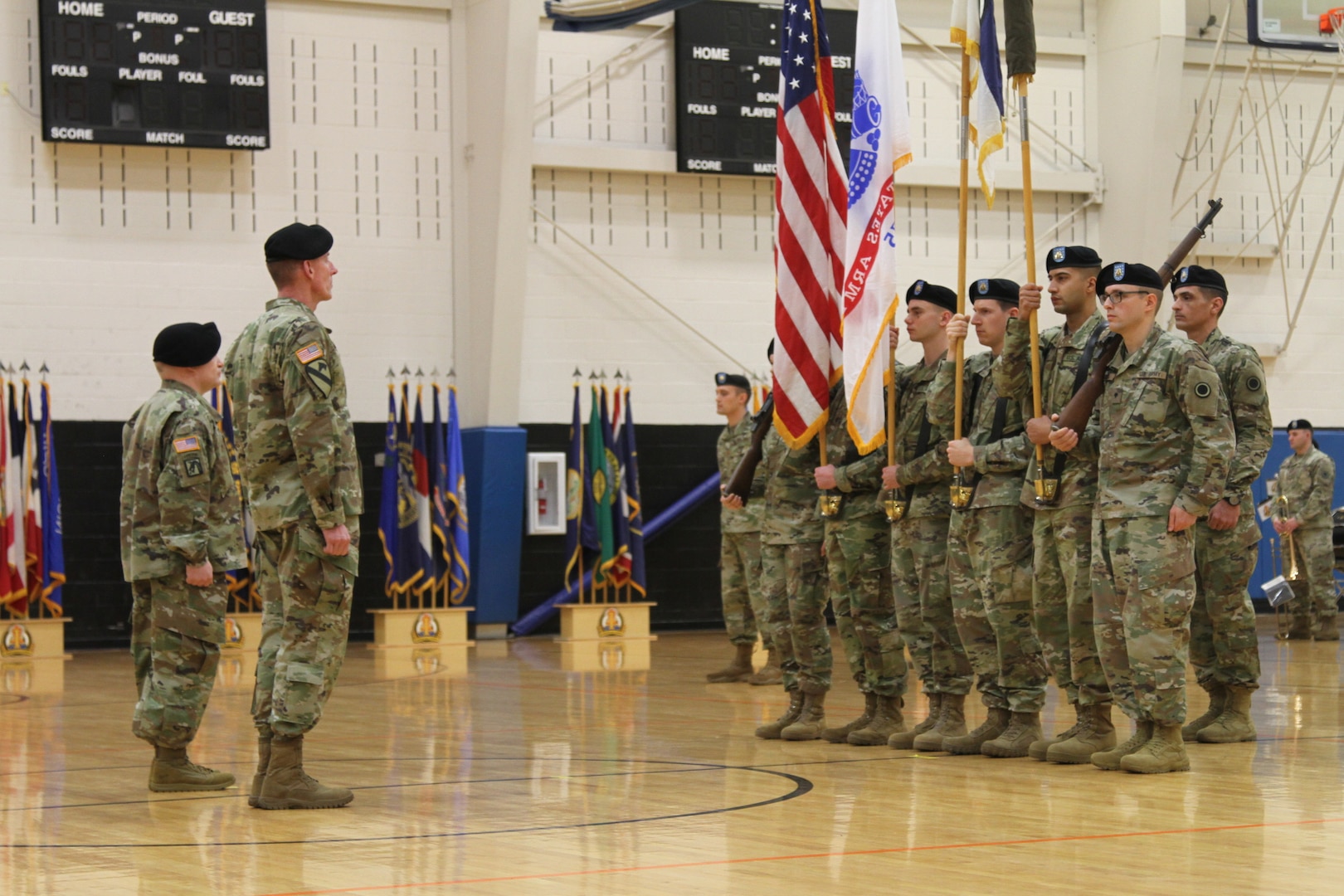 America’s First Corps Commanding General Lt. Gen. Gary Volesky and Lt. Col. Derek Bothern, battalion commander of the newly activated Intelligence, Information, Cyber, Electronic Warfare and Space Detachment prepare to receive the unit flag for I2CEWS during a ceremony Jan. 11, 2019, at Joint Base Lewis McChord, Washington. The ceremony marked the launch of the first-ever Intelligence, Information, Cyber, Electronic Warfare and Space Detachment in the U.S. Army. I2CEWS was designed to integrate cyber warfare, electronic warfare and space capabilities. (U.S. Army photo by Pvt. Caleb Minor)