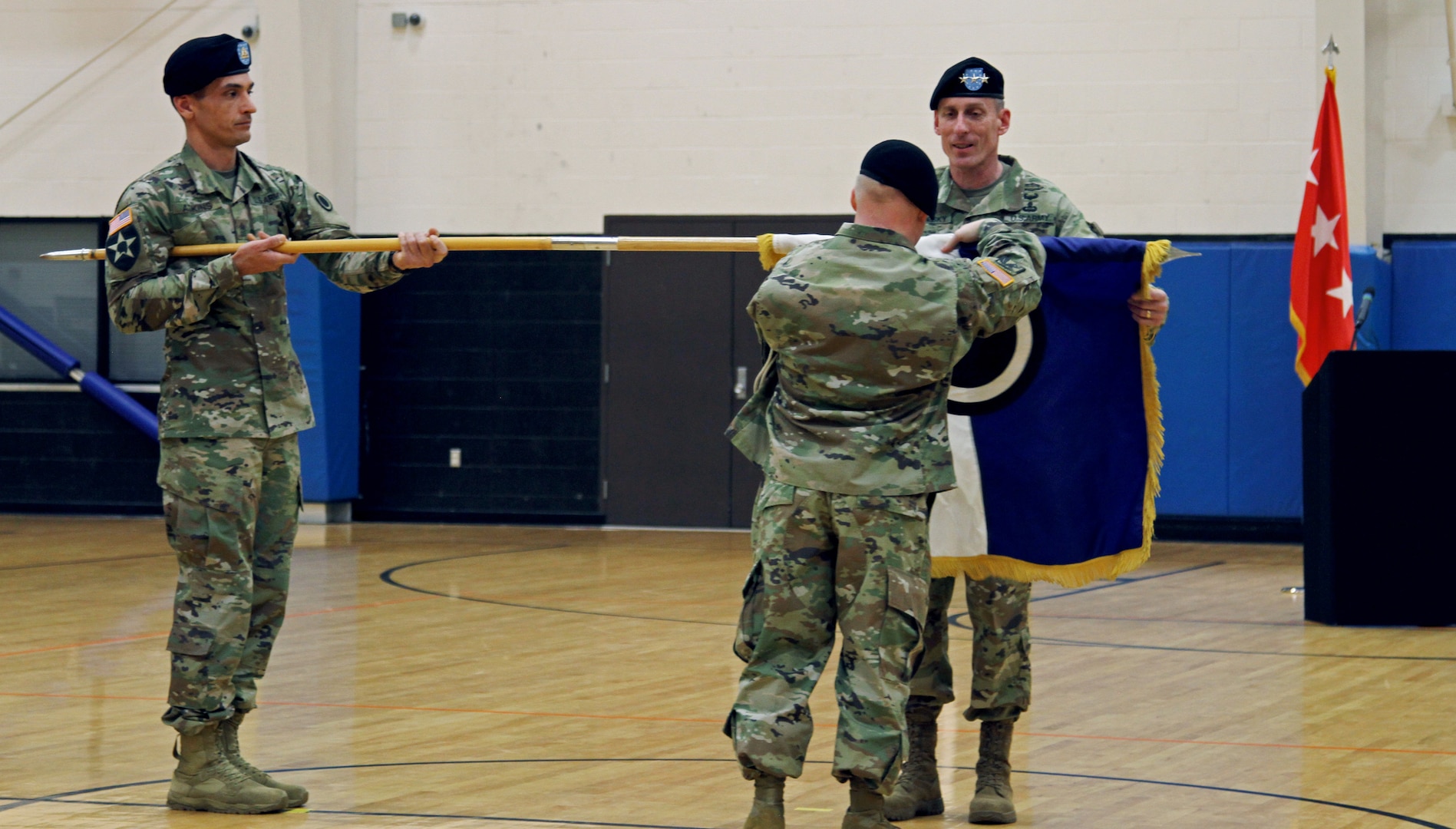 America’s First Corps Commanding General Lt. Gen. Gary Volesky and Lt. Col. Derek Bothern, battalion commander of the newly activated Intelligence, Information, Cyber, Electronic Warfare and Space Detachment unveil the I2CEWS unit flag during a ceremony Jan. 11, 2019, at Joint Base Lewis McChord, Washington. The ceremony marked the launch of the first-ever Intelligence, Information, Cyber, Electronic Warfare and Space Detachment in the U.S. Army. I2CEWS was designed to integrate cyber warfare, electronic warfare and space capabilities. (U.S. Army photo by Pvt. Caleb Minor)