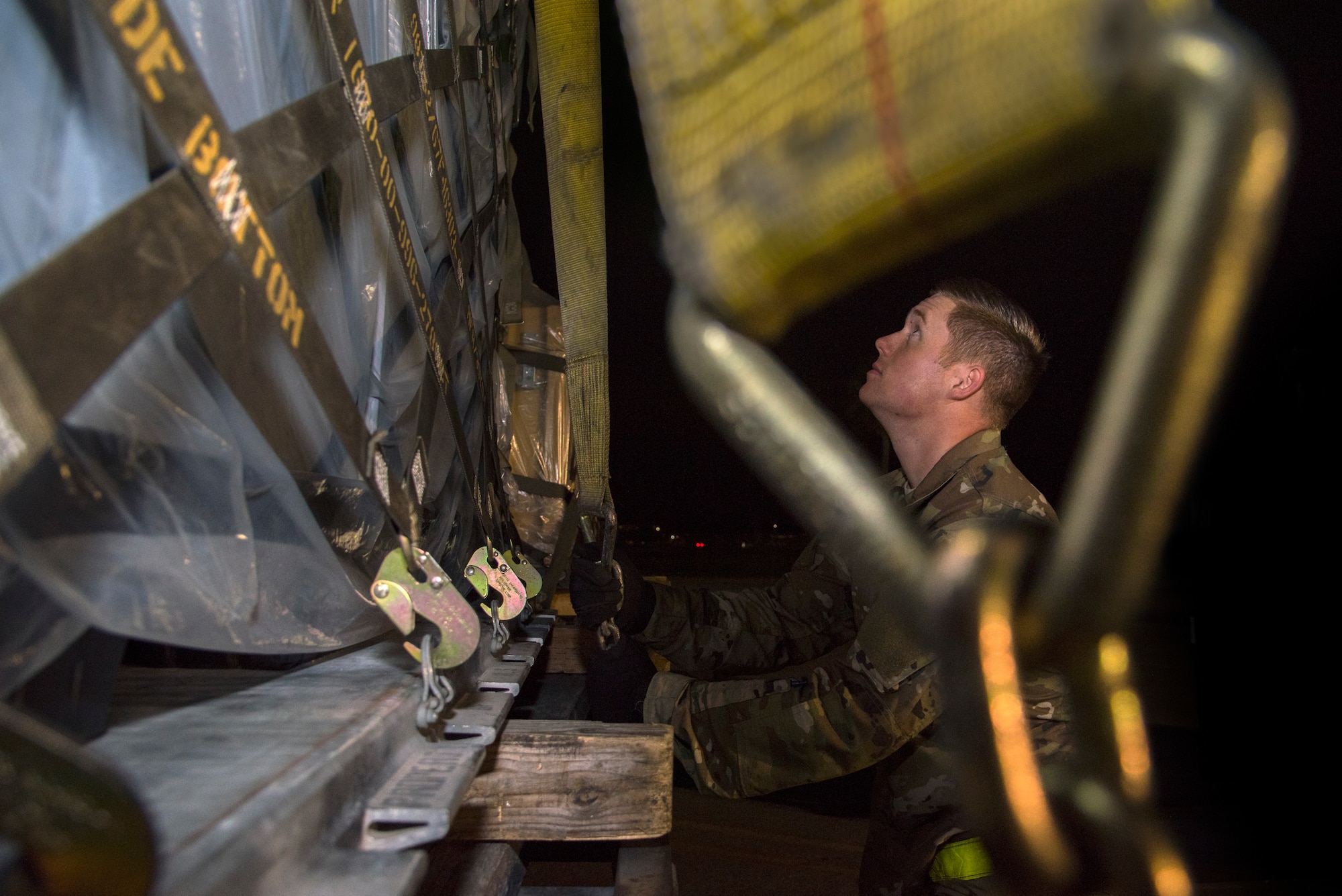 A U.S. Air Force 6th Logistics Readiness Squadron (LRS) Airman secures cargo during an operational readiness exercise at MacDill Air Force Base, Fla., Feb. 9, 2019. The 6th LRS worked alongside 927th Air Refueling Wing Airmen during the three-day exercise that staged a cargo deployment function responsible for receiving, checking-in, inspecting, marshaling, load planning, manifesting shipments and supervising cargo loading.