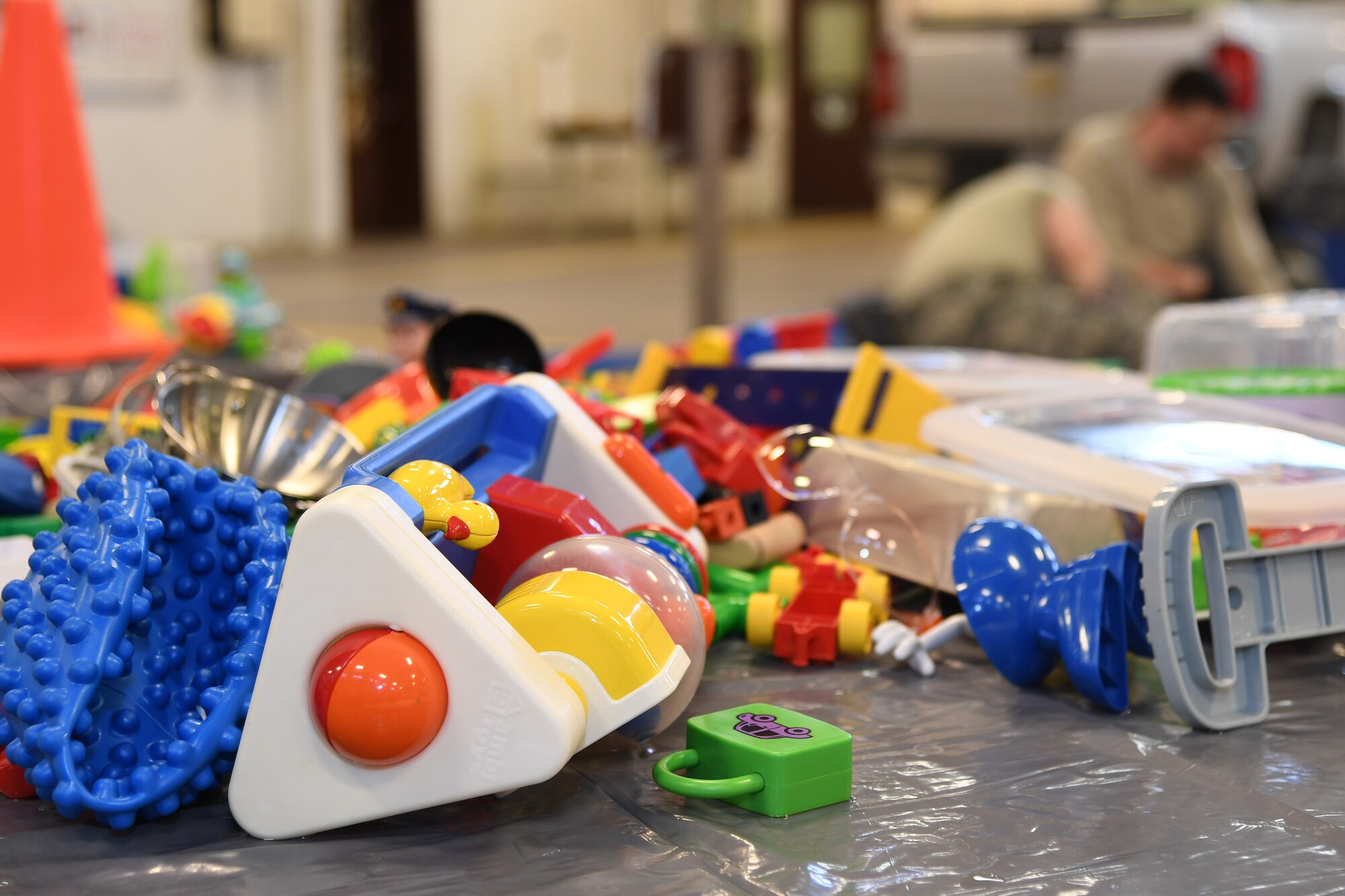 Toys air-dry after going through a sanitation process to include a bleach-solution soak, soapy water scrub, and final rinse January 18, 2019, on Grand Forks Air Force Base, North Dakota. More than 20 Airmen with the 319th Logistics Readiness Squadron worked transferring toys between each station, scrubbing toys of all sizes and ensuring each nook and cranny was dry prior to being returned to their origins- the base Child Development Center and Youth Programs. The toys needed to be cleaned after several Grand Forks AFB family members and personnel came down with a highly-contagious gastrointestinal virus, which spread to the CDC and other high-traffic areas. (U.S. Air Force photo by Senior Airman Elora J. Martinez)