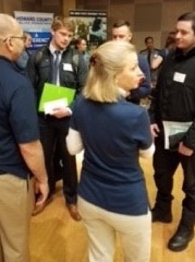 Brenda Minnema and Craig White recruit at the 2019 OSU Spring Career Fair while manning the DLA Land and Maritime Booth.