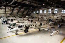 The 458th Airlift Squadron hosts 7 C-21 aircraft inside a hangar at Scott Air Force Base, Illinois on Feb. 9, 2019. This year, the 458th AS will become America's sole C-21 squadron after 35 years of C-21 operations. A $38 million avionics upgrade for the fleet is underway and a consolidation effort is moving four aircraft from Joint Base Andrews, Maryland, to join Scott’s 10 C-21s by late summer, bringing the total of 14 aircraft assigned here.