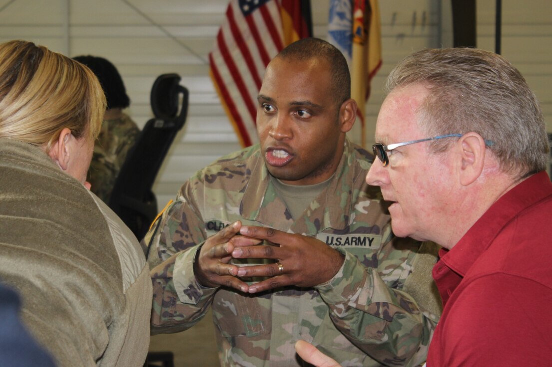 Lt. Col. Torrance Cleveland, commander Army Field Support Battalion-Benelux, discusses logistical requirements for drawing APS in support of U.S. Army Europe’s mission readiness with Maj. Michelle Kelly, 21st Theater Sustainment Command (left), and Joe Pound, program manager Europe, U.S. Army Medical Materiel Agency, at Coleman Work Site, Mannheim, Germany, Feb. 4.