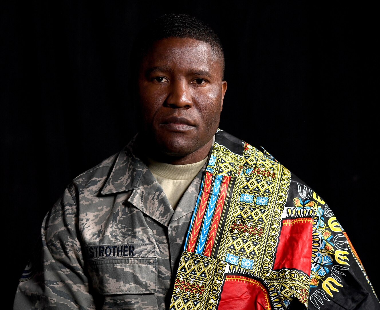 U.S. Air Force Tech. Sgt. Francis Strother, recruiter for the 145th Airlift Wing, poses at the North Carolina Air National Guard (NCANG) Base, Charlotte Douglas International Airport, Jan. 17, 2019. Strother tells a story of how he came from Monrovia, Liberia, following a civil war in his country that lasted almost eight years. Strother details his struggles of helping raise his brothers and feed his neighbors while maintaining a positive and hopeful attitude.