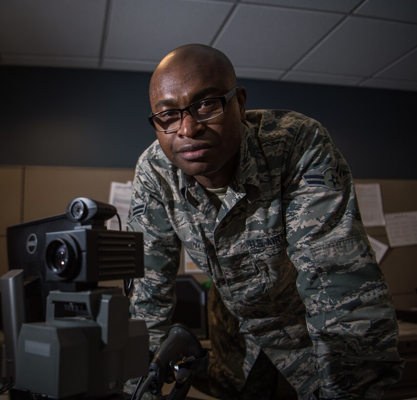 Airman First Class Nestor Biayi, personalist with the 932nd Force Support Squadron, poses for a portrait, Feb. 8, 2019, 932nd Airlift Wing Headquarters, Scott Air Force Base, Illinois. Biayi works in customer service helping to update records and issue IDs. (U.S. Air Force photo by Christopher Parr)