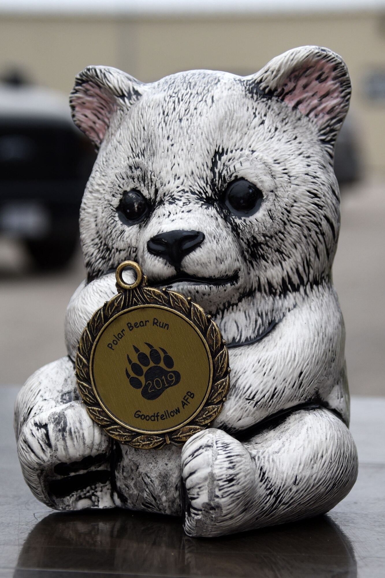 A polar bear trophy sits on display at the annual Polar Bear Run and Swim at the Goodfellow Recreation Camp on Lake Nasworthy, Texas, Feb. 9, 2019. Trophies were awarded to the top male and female runners. (U.S. Air Force photo by Senior Airman Seraiah Hines/Released)