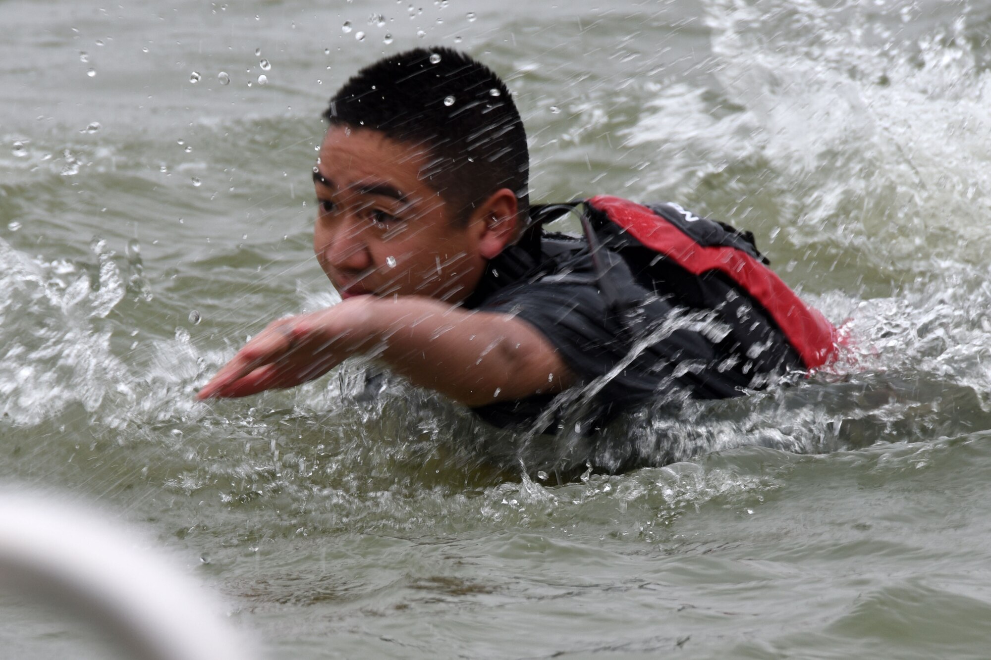 U.S. Air Force 2nd Lt. Matthew Silpasornprasit, 17th Force Support Squadron officer in-charge of military personnel flight, joined in the festivities at the annual Polar Bear Run and Swim at the Goodfellow Recreation camp on Lake Nasworthy, Texas, Feb. 9, 2019. This year over 30 individuals participated in the run and swim. (U.S. Air Force photo by Senior Airman Seraiah Hines/Released)