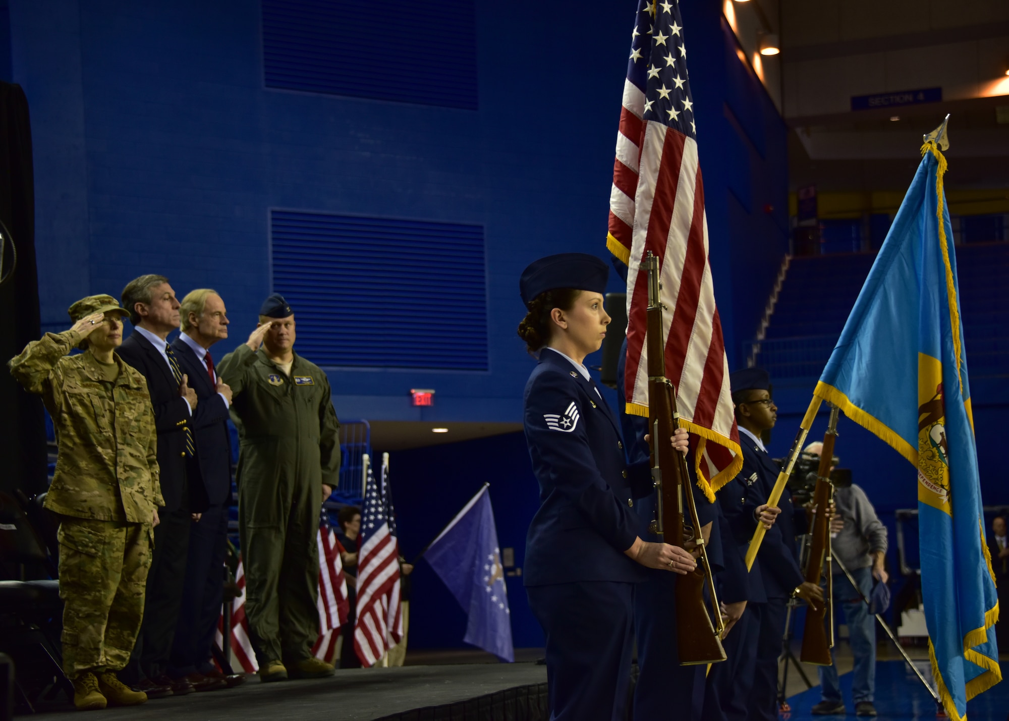 Leadership from the state of Delaware stand for the playing of the National Anthem at the University of Delaware’s Bob Carpenter Center in Newark, Del., Feb. 10, 2019. Governor John Carney, the Adjutant General, Air Force Maj. Gen. Carol Timmons, the senior senator from the state, Tom Carper and wing commander, Col. Lynn Robinson were in attendance for the event. (U.S. Air National Guard photo by Senior Airman Katherine Miller)