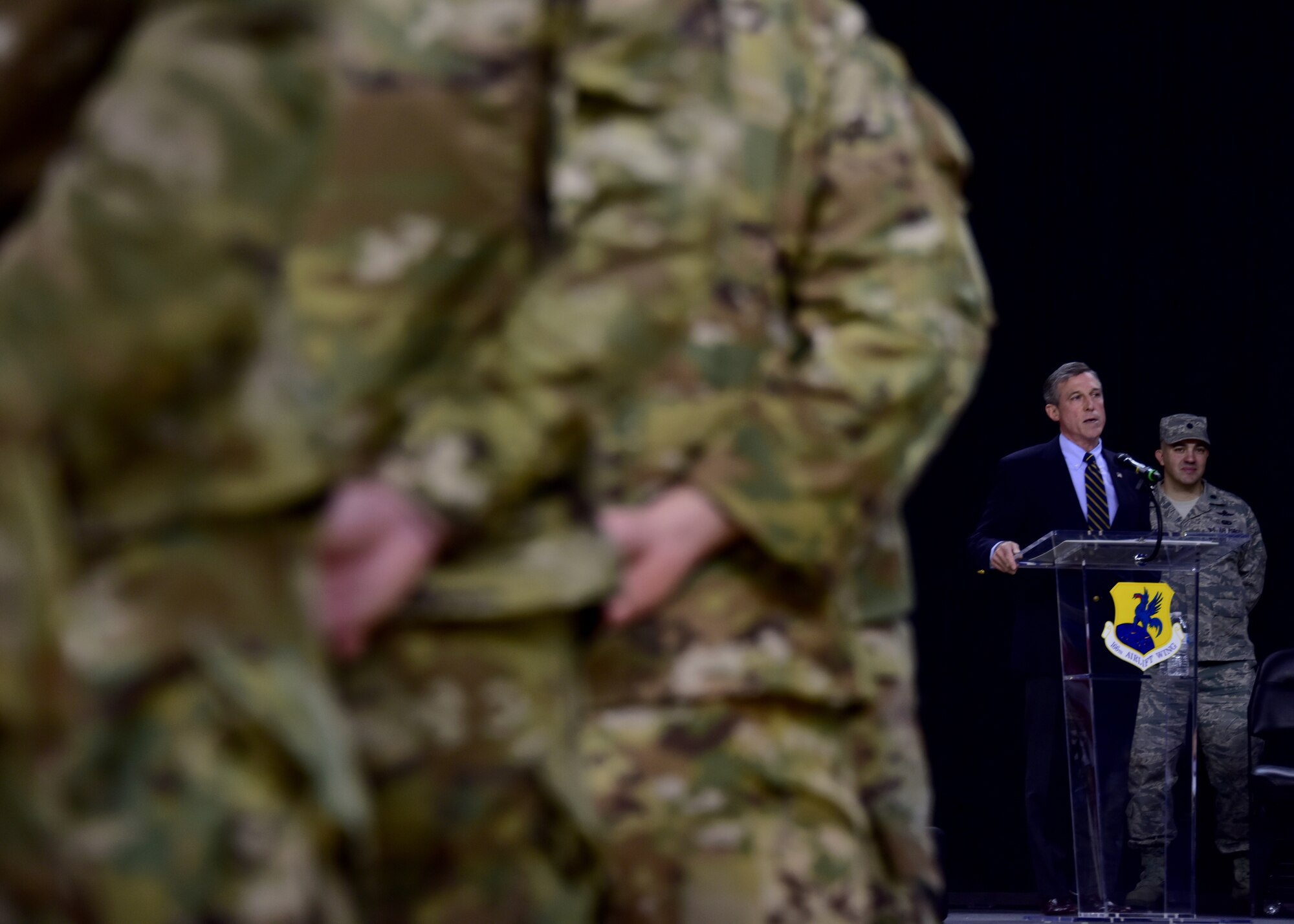 Governor John Carney addresses the formation of Airmen formation during the Homecoming Ceremony at the University of Delaware’s Bob Carpenter Center in Newark, Del., Feb. 10, 2019. Pilots, maintainers, civil engineers, logisticians, security forces, flight nurses and finance personnel are among the many career fields of the Airmen who deployed. (U.S. Air National Guard photo by Senior Airman Katherine Miller)