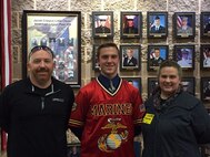 LITTLE CHUTE, Wisc. – Shiloh Bent, a Kaukauna, Wisconsin, native, announced his decision of joining the military at Little Chute High School on Tuesday, October 16th for Signing Day. This day is for students to show off their accomplishments to the rest of the school and inspire them. Bent chose to enlist in the Marine Corps through Recruiting Sub-Station Appleton.
	Bent has family in the military whom have served in the military. This influenced his big decision to enlist.
	“My grandfather was in the Army and served many years,” said Bent. “He is one of my biggest supporters when it came to my decision to enlist in the Marines.”
	Bent trains with the recruiters of RSS Appleton to prepare himself for boot camp.
“He’s already starting to show improvement since the first time he’s trained with us at the recruiting office,” said Staff Sgt. Brent Howard, RSS Appleton’s staff non-commissioned officer-in-charge. “He’s very motivating. He motivates all the other poolees around him.”
	Bent’s picture will go up at his school in the Cove of Valor upon graduation of recruit training. This wall is where students and faculty can honor the men and women who serve the country.
“It is such an honor to think my picture will be up there along those who served before me,” said Bent. “I know to get there I’m going to face many challenges, but I’m really looking forward to earning the title United States Marine.”