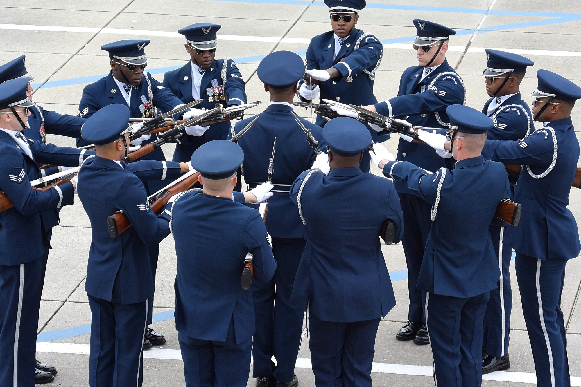 The U.S. Air Force Honor Guard Drill Team debuts their 2019 routine in front of Keesler leadership and 81st Training Group Airmen on the Levitow Training Support Facility drill pad at Keesler Air Force Base, Mississippi, Feb. 8, 2019. They are the nation's most elite honor guard, serving the President of the United States, the Air Force's most senior leaders and performing nationwide for the American public. The team comes to Keesler every year for five weeks to develop a new routine that they will use throughout the year. (U.S. Air Force photo by 2nd Lt. Jantzen Floate)