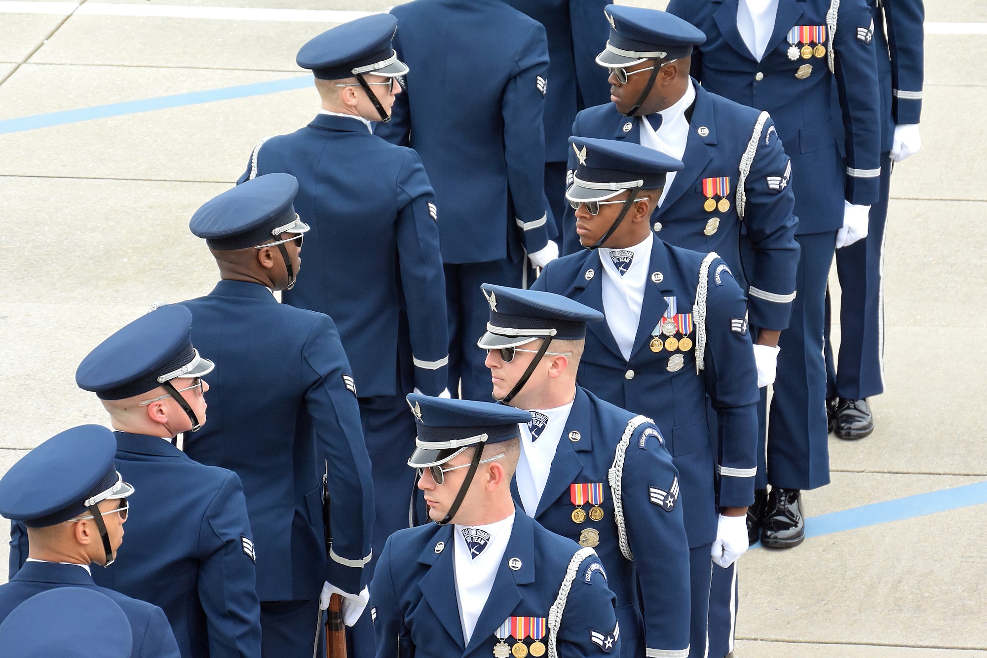 The U.S. Air Force Honor Guard Drill Team debuts their 2019 routine in front of Keesler leadership and 81st Training Group Airmen on the Levitow Training Support Facility drill pad at Keesler Air Force Base, Mississippi, Feb. 8, 2019. They are the nation's most elite honor guard, serving the President of the United States, the Air Force's most senior leaders and performing nationwide for the American public. The team comes to Keesler every year for five weeks to develop a new routine that they will use throughout the year. (U.S. Air Force photo by 2nd Lt. Jantzen Floate)