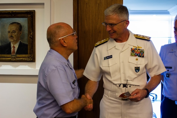 The commander of U.S. Southern Command, Navy Adm. Craig Faller, meets with Brazil's Air Force Commander, Lieutenant-Brigadier Antonio Carlos Moretti Bermudez, in Brasília Feb. 11, 2019.