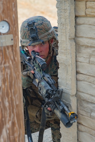 U.S. Marine Corps Cpl. Henry Young, an anti-tank missile gunner with 1st Tank Battalion, provides security for a patrol during the 1st Marine Division (MARDIV) Super Squad Competition at Marine Corps Base Camp Pendleton, California, Aug. 29, 2018.