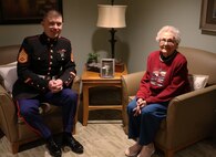 CEDARBURG, Wisc --- Staff Sgt. Nicholas Ranum, a Marine Corps Recruiting Station Milwaukee Marketing and Communications Marine, visited Ruth Voight-Holman, a Marine World War II Veteran, at Lasata Senior Living Campus in Cedarburg, Wisconsin, on Wednesday, January 23rd. He talked with her and bonded over their time in the Marines.