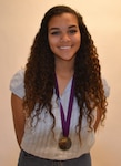 Raquelle Bennett, a junior at Cole High School, won the superior rating medal in the photography portfolio competition at the Journalism Education Association/National Scholastic Press Association National High School Journalism Convention held in November in Chicago. She was one of only three high school students from across the U.S. who earned the superior rating in the portfolio category.