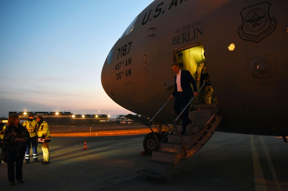 Acting Secretary of Defense Patrick M. Shanahan exits a plane.
