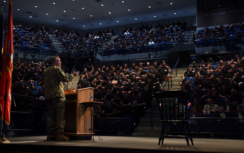 An admiral delivers a lecture to midshipmen in Alumni Hall at the U.S. Naval Academy in Annapolis, Md.