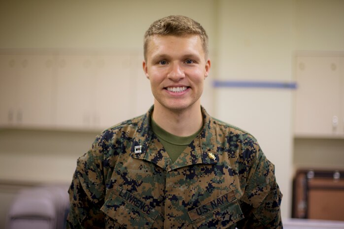 Navy Lt. Michael J. Lawrence, a general dentist with Branch Dental Clinic Evans, 3rd Dental Battalion, 3rd Marine Logistics Group, is a native of Troutdale, Oregon. Sailors from Naval clinics in Okinawa held a presentation at Kinser Elementary School to promote oral health awareness during National Children’s Dental Health Month Feb. 5, 2019 on Camp Kinser, Okinawa, Japan. (U.S. Marine Corps photo by Lance Cpl. Isaiah Campbell)