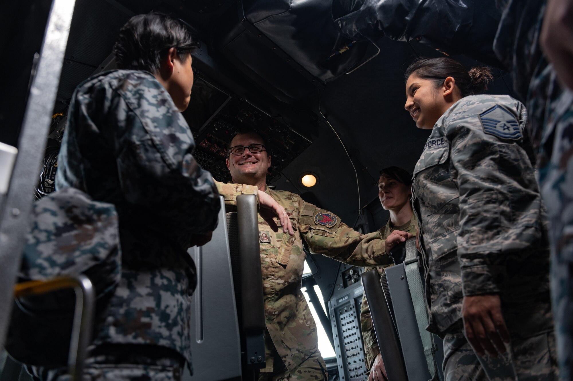 U.S. Air Force Master Sgt. Michael Gillette, 1st Special Operations Squadron superintendent, gives a briefing about the MC-130H Combat Talon II to Japan Air Self-Defense Force Airmen and U.S. service members Nov. 26, 2018, during the 2018 Bilateral Exchange at Kadena Air Base, Japan. The exchange lasted 10 days and enabled 30 U.S. service members and JASDF Airmen to strengthen teamwork, develop communication skills and build camaraderie. (U.S. Air Force photo by Staff Sgt. Micaiah Anthony)