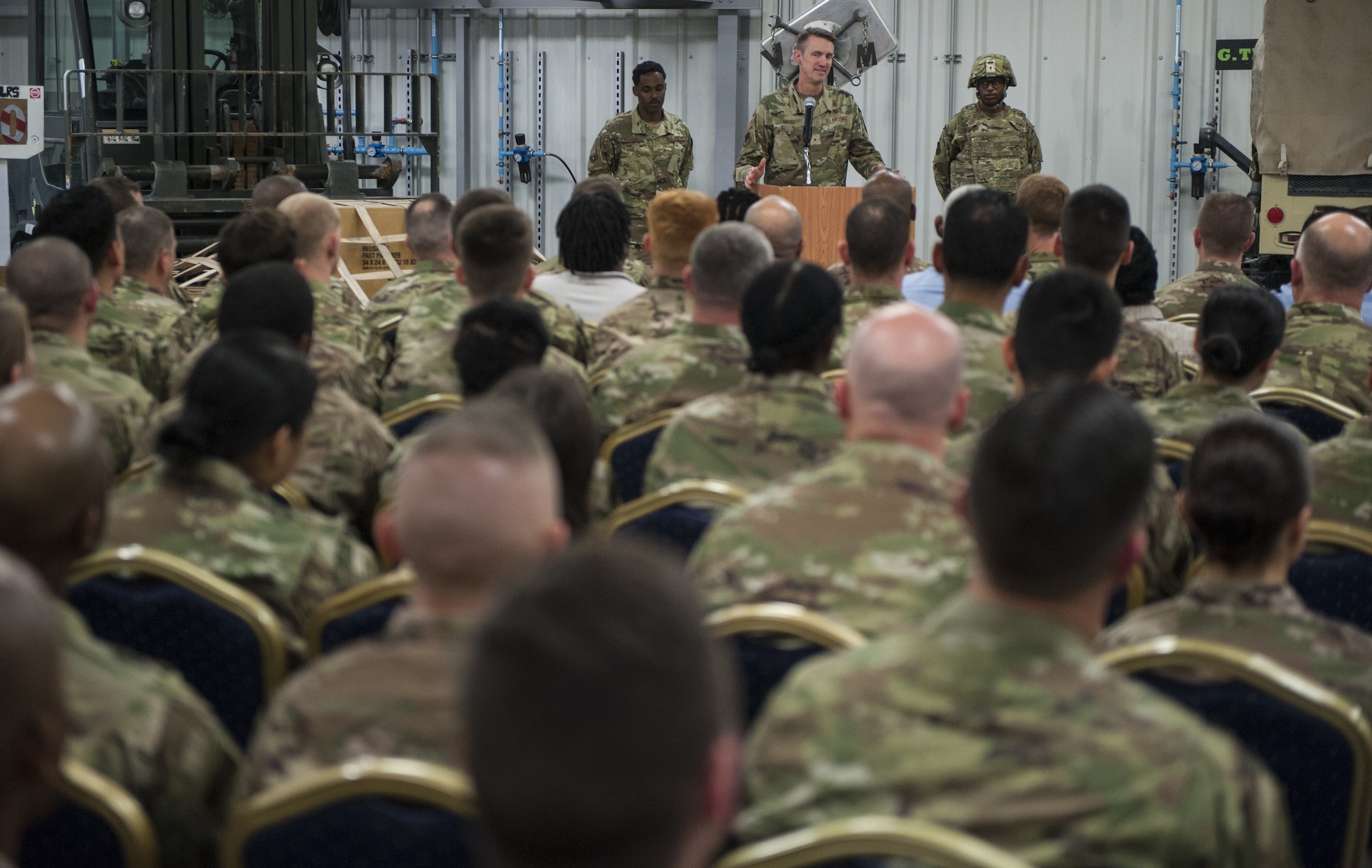 Brig. Gen. Tom Miller, Air Combat Command director of Logistics, Engineering, and Force Protection, speaks during a “Daedalian” award ceremony in honor of the 379th Expeditionary Logistics Readiness Squadron, Feb. 11, 2019 at Al Udeid Air Base, Qatar.