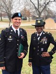 Ohio Army National Guard Spec. Adam Slabodnick stands with his drill sergeant after completing advanced individual training in December 2018 at Fort Leonard Wood, Mo., to become a transportation operator. Slabodnick, a health and physical education teacher in northern Ohio, joined the National Guard at the age of 35 and will drill with the 1485th Transportation Company in Dover, Ohio.