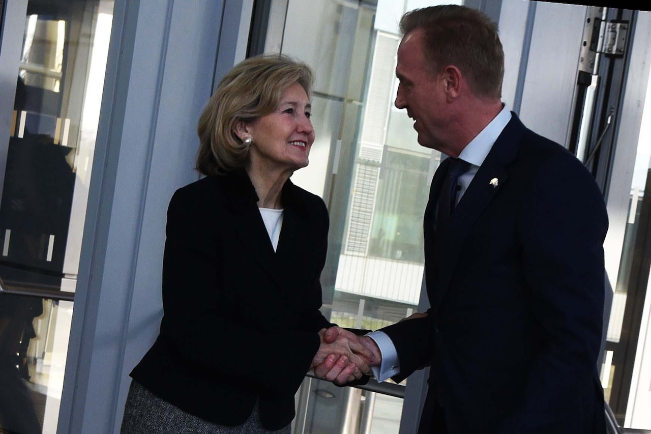 Acting Defense Secretary Patrick M. Shanahan greets U.S. Ambassador to NATO Kay Bailey Hutchison.