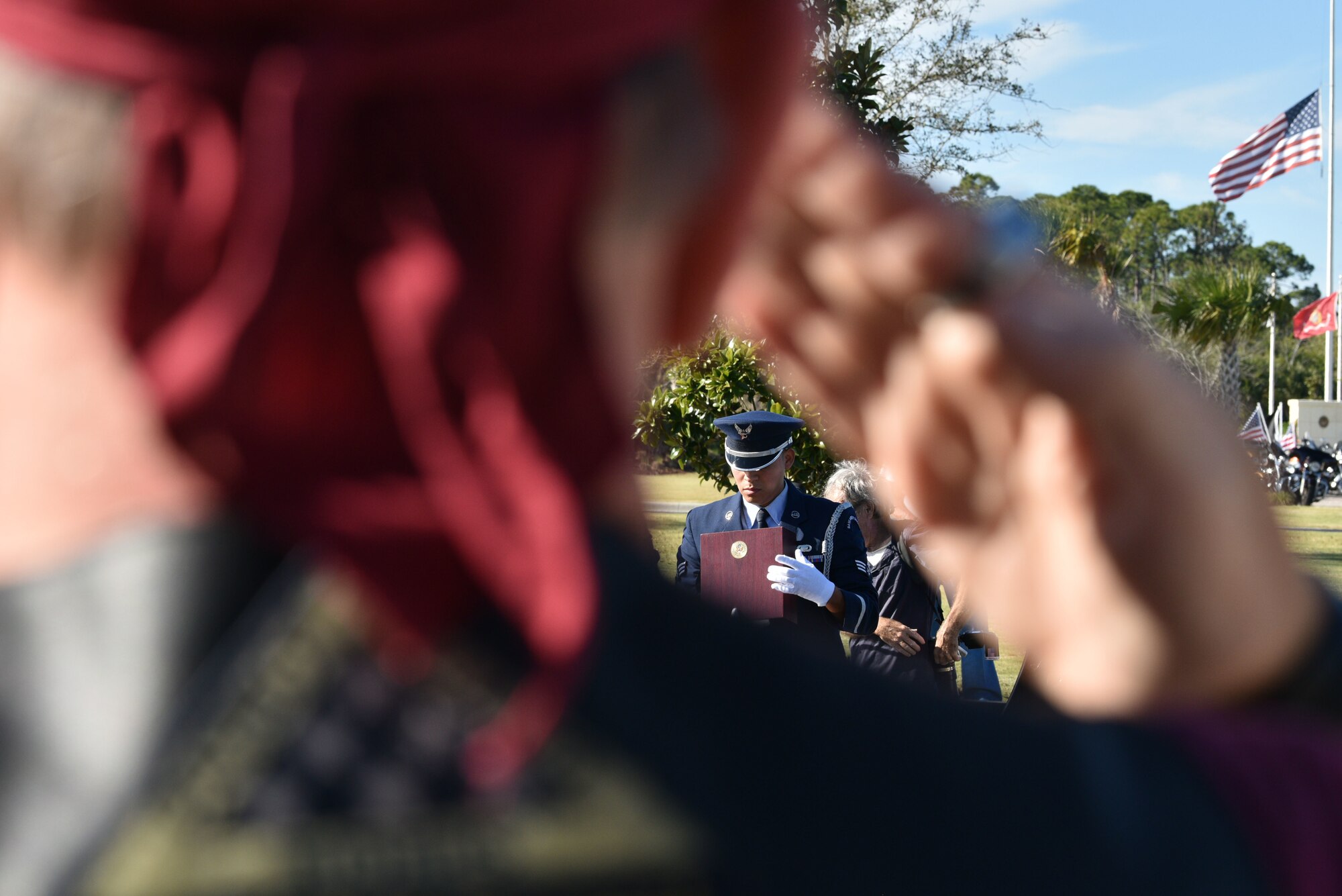 Edwin T. Cowan, Tuskegee Airman, and his wife Theda's remains, are showered with salutes during their funeral, Feb. 7, 2019 at Cape Canaveral National Cemetery in Mims, Fla. Both were buried at the cemetery and he was given full military honors. (U.S. Air Force photo by Airman 1st Class Dalton Williams)