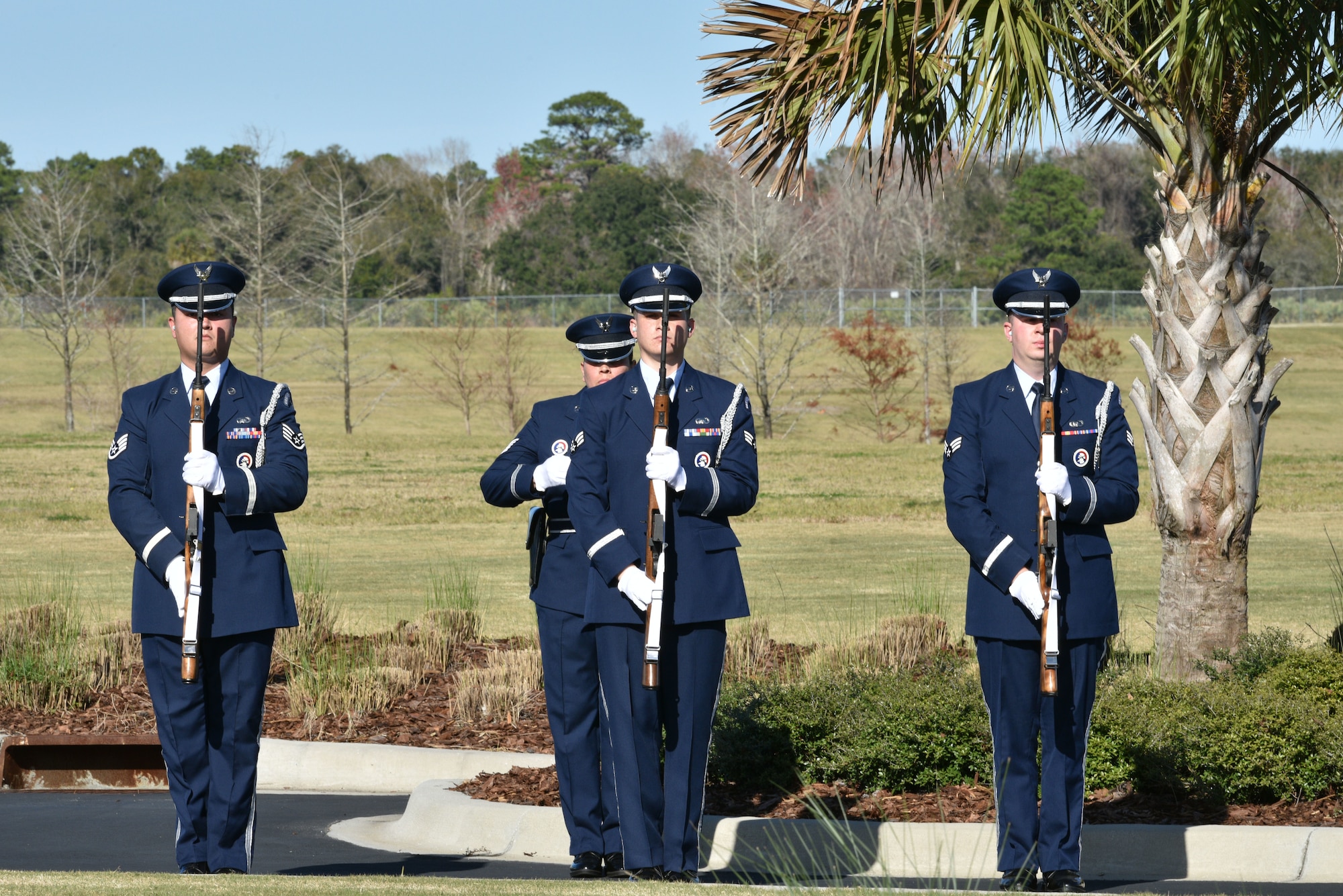 Patrick Air Force Base Honor Guard perform a three volley salute for Edwin T. Cowan, Tuskegee Airman, during his funeral, Feb. 7, 2019 at Cape Canaveral National Cemetery in Mims, Fla. Cowan was buried with full military honors, alongside his wife Theda. (U.S. Air Force photo by Airman 1st Class Dalton Williams)