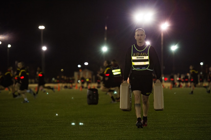 U.S. Army Staff Sgt. Sean Chilcote, Alpha Company, 1st Battalion, 210th Aviation Regiment, 128th Avn. Brigade drill sergeant, conducts physical training with his company at Joint Base Langley-Eustis, Virginia, Feb. 6, 2019.