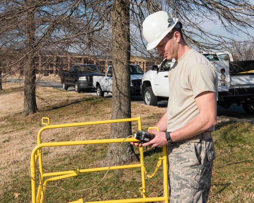 U.S. Air Force Airman 1st Class Kaden Norwood, 633rd Communication Squadron cable and antenna technician, monitors the gas reader during routine cable checks on Joint Base Langley-Eustis, Virginia, February 8, 2019.