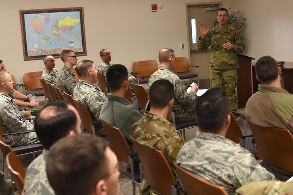 Maj. Gen. Robert Skinner, 24th Air Force commander, talks with 21st Communications Squadron cyber warfare officers at Peterson Air Force Base, Colorado, Feb. 8, 2019. Skinner and Chief Master Sgt. David Klink, 24th AF command chief, visited the squadron to meet and recognize Airmen for their mission accomplishments.   (U.S. Air Force photo by Robb Lingley)