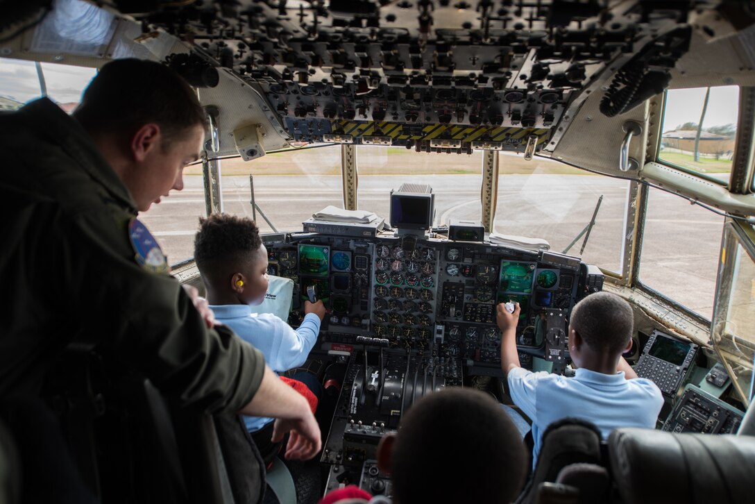 Students from Thelma S. Morris Elementary School find out what it feels like to be in the pilot’s seat of a C–130 Hercules during a base visit Feb. 5, 2019, Maxwell Air Force Base, Alabama. The 42nd OSS invited T.S. Elementary School students and their teachers to demonstrate the different mission sets and careers of the Air Force, specifically careers that are STEM related. (U.S. Air Force photo by Senior Airman Alexa Culbert)
