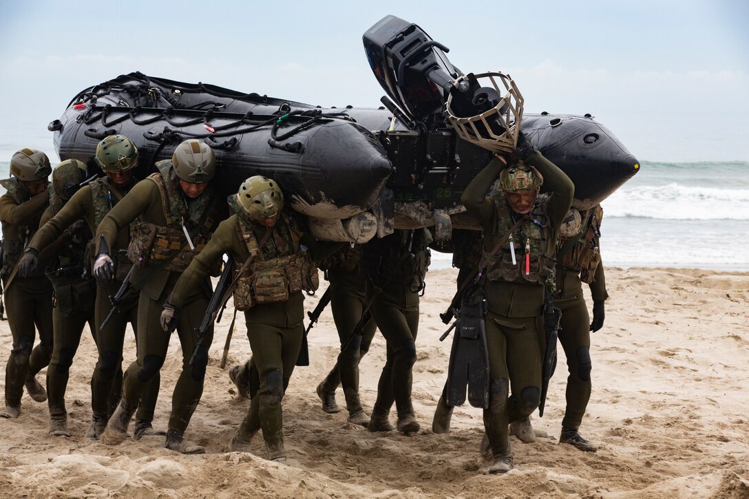 Japan Ground Self-Defense Force (JGSDF) Soldiers move a combat rubber raiding craft inland during Iron Fist 2019, Feb. 1, on U.S. Marine Corps Base Camp Pendleton, CA.