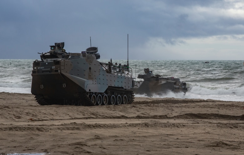 U.S. Marines assigned to 1st division and Japan Ground Self-Defense Force (JGSDF) Soldiers with 1st Amphibious Rapid Deployment Regiment, come ashore in assault amphibious vehicles during an amphibious landing exercise for Iron Fist 2019, Feb. 4, on U.S. Marine Corps Base Camp Pendleton, CA