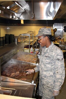 Airman 1st Class Dontrell Lattimore, 127th Force Support Squadron, slices onions in advance of lunch service at Selfridge Air National Guard Base, Mich., Feb. 3, 2019