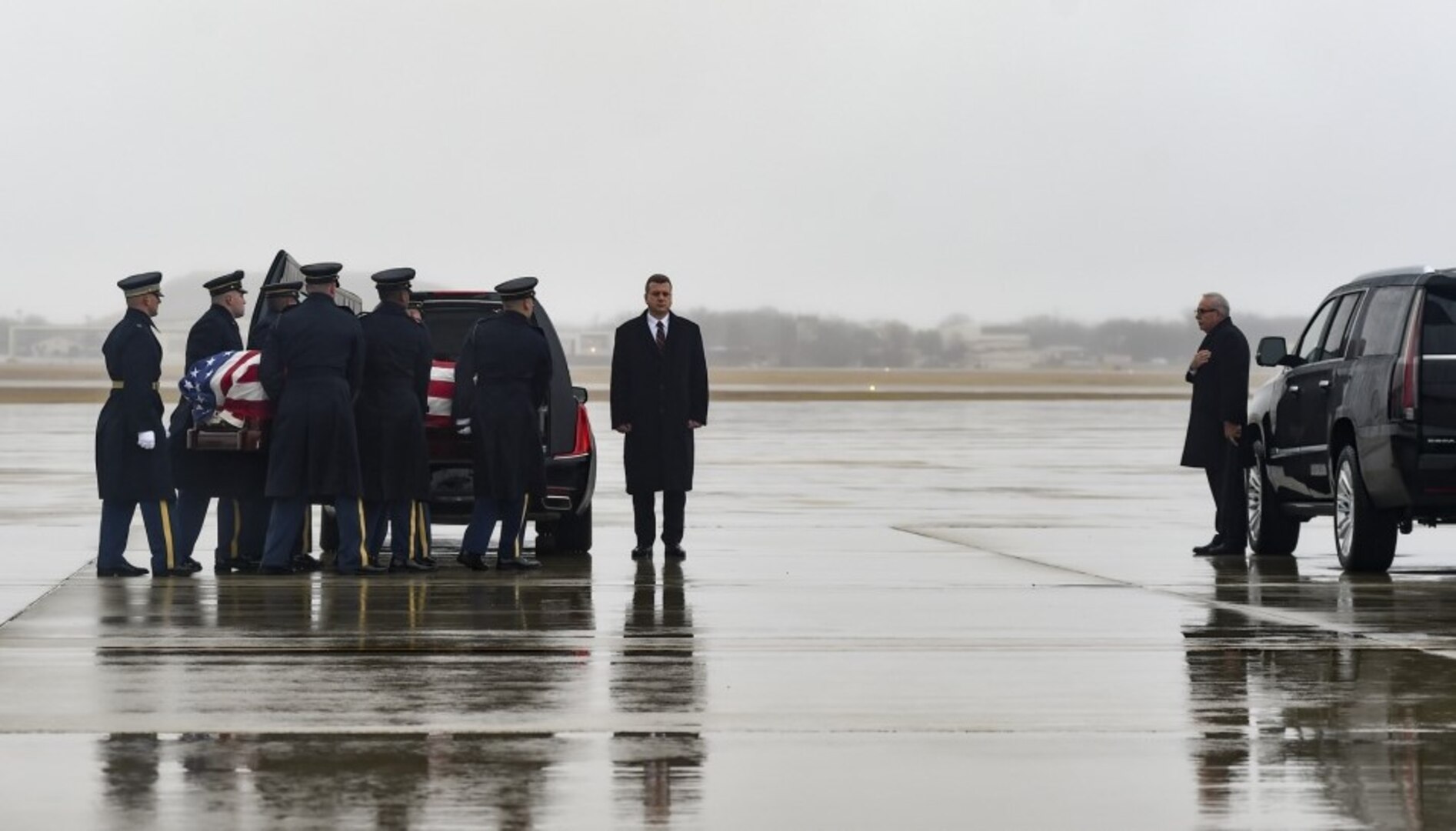 The U.S. Army 3rd Infantry Regiment (The Old Guard) body bearer team carries the casket of World War II Army veteran and former Rep. John D. Dingell (D-Mich.) at an Arrival Ceremony at Joint Base Andrews, Md., Feb. 12, 2019.