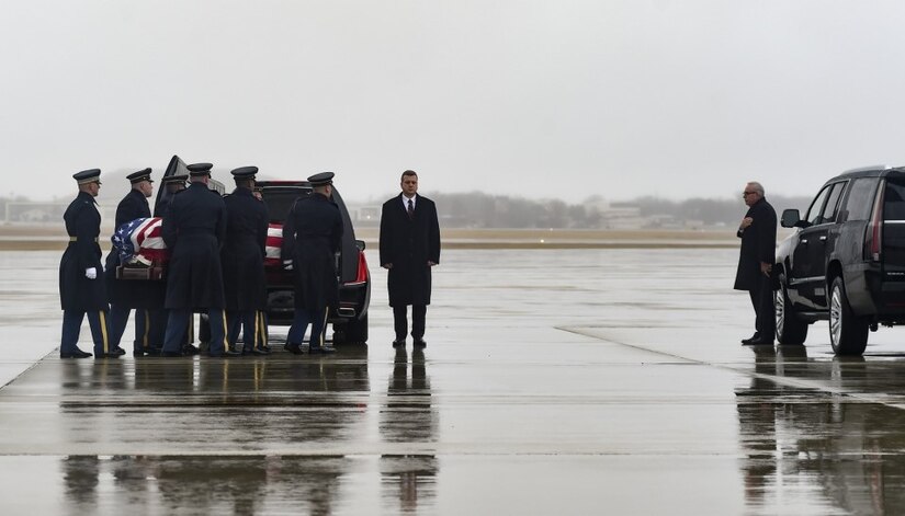 The U.S. Army 3rd Infantry Regiment (The Old Guard) body bearer team carries the casket of World War II Army veteran and former Rep. John D. Dingell (D-Mich.) at an Arrival Ceremony at Joint Base Andrews, Md., Feb. 12, 2019.