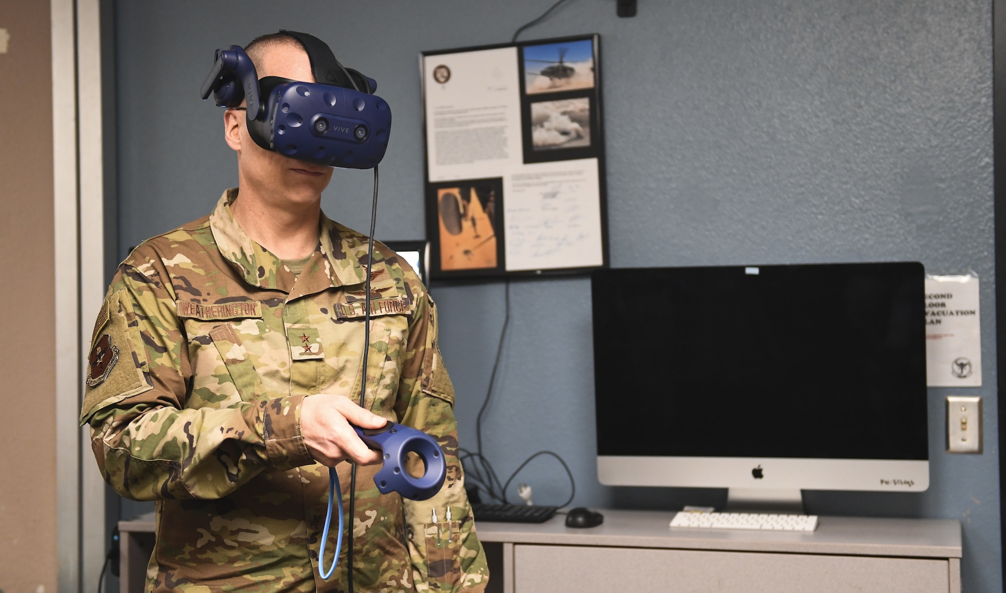 Maj. Gen. Mark E. Weatherington, Air Education and Training Command deputy commander, tries a virtual reality training tool.