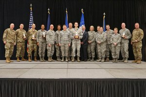 Brig. Gen. John D. Slocum (pictured far left), commander of the 127th Wing, and Chief Danny McDow (pictured far right), command chief master sergeant of the 127th Wing, awarded winners of the Wing’s 2018 annual awards program at Selfridge Air National Guard Base, on December 1, 2018.