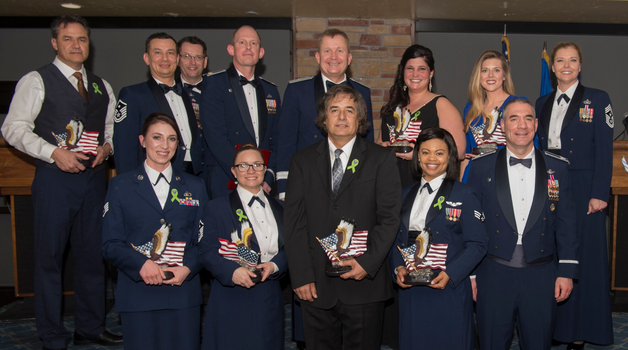 2018 annual award winners pose for a photo, Feb. 9, 2019, on Holloman Air Force Base, N.M. During the banquet, 14 Holloman Airmen received awards for their outstanding performance throughout the year. (U.S. Air Force photo by Airman Quion Lowe)
