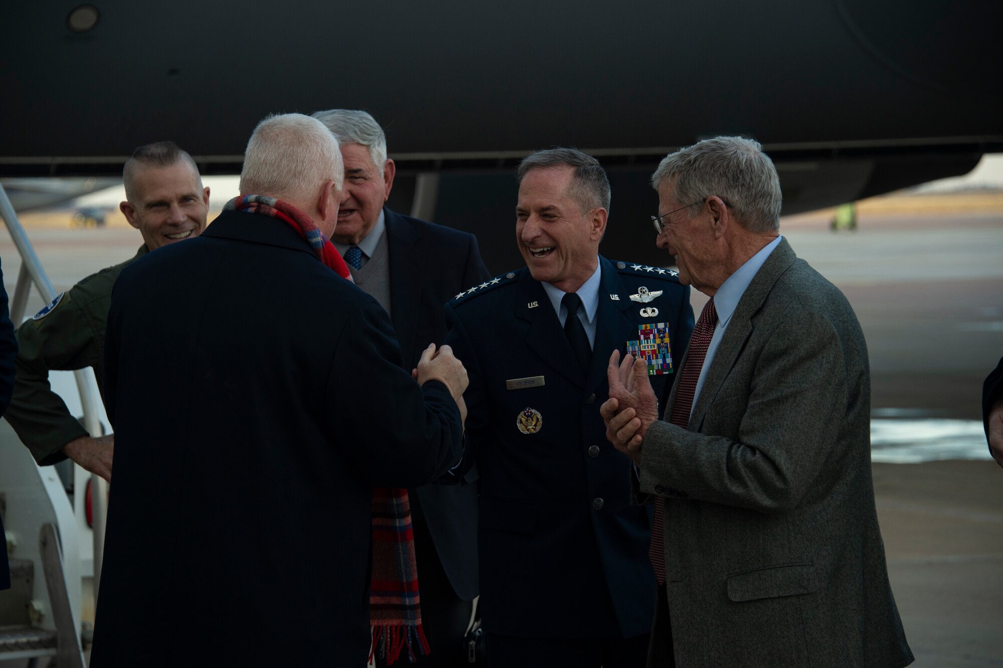 a man talking to a crowd