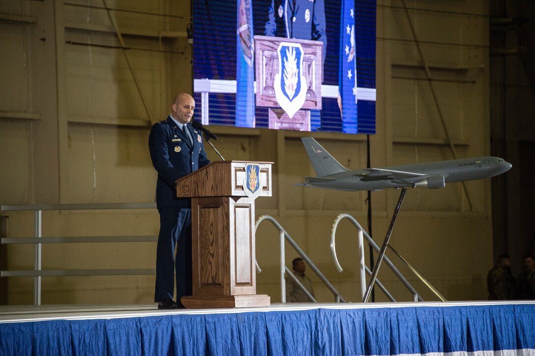 a man talking to a crowd