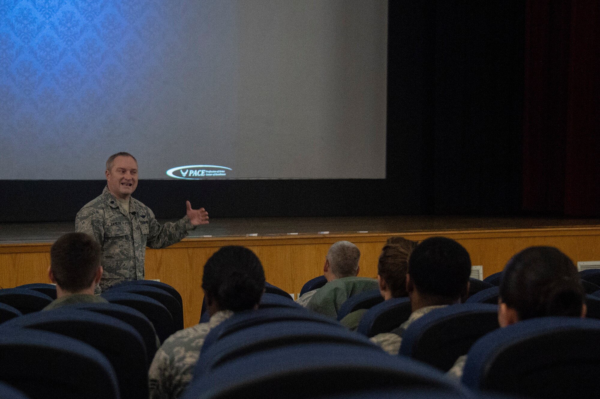 U.S. Air Force Lt. Col. Matt Basler, Profession of Arms Center of Excellence (PACE) senior professionalism, consultant talks about being a leader during the Enhancing Human Capitol seminar