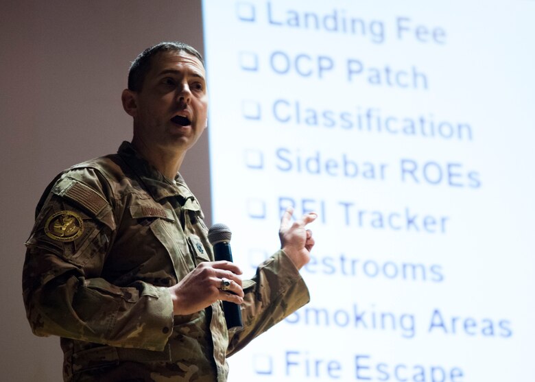 U.S. Air Force Lt. Col. Joseph Monaco, Air Mobility Command Mobility Guardian 2019 director, briefs MG19 International Planning Conference attendees at the base theater at Fairchild Air Force Base, Washington, Feb. 5, 2019.