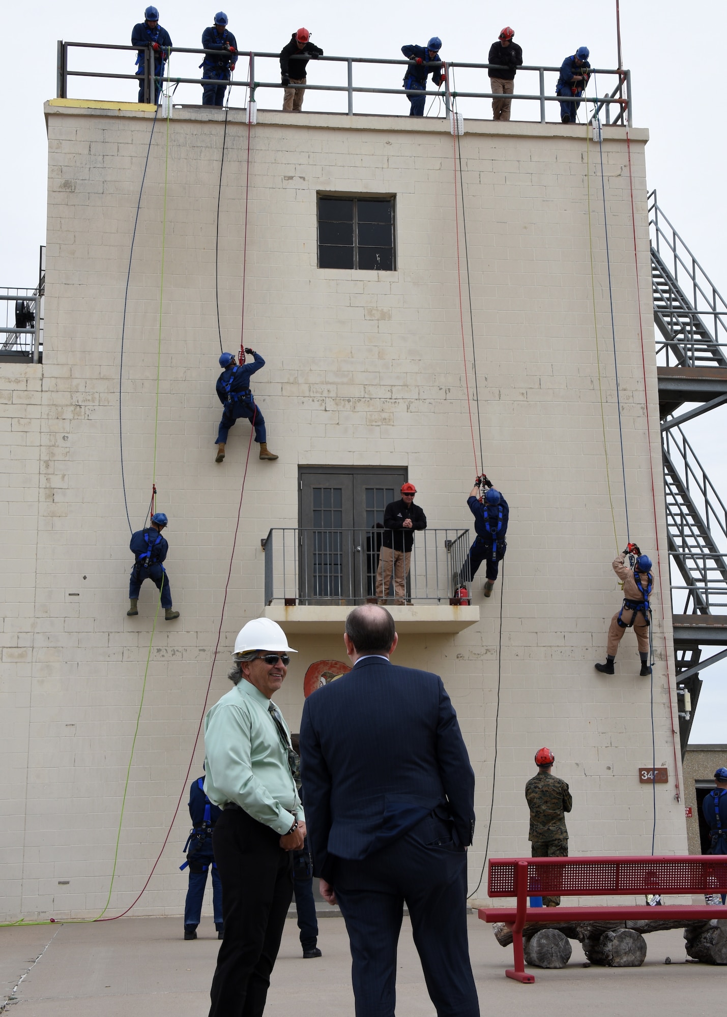 The 312th Training Squadron Flight Chief, Michael Dejacomo discusses training with the Under Secretary of the Air Force Matthew P. Donovan during Donovan’s tour of Goodfellow Air Force Base, Texas, Feb. 13, 2019. The 312th TRS is innovating the way the Air Force trains its future firefighters. (U.S. Air Force photo by Airman 1st Class Zachary Chapman/Released)