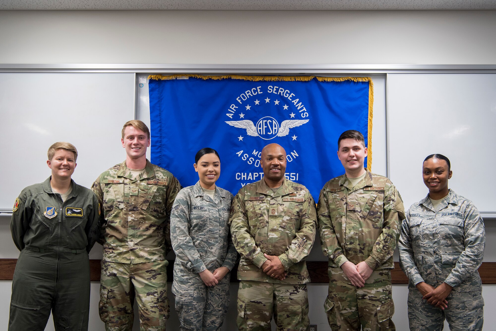 Chief Master Sgt. Elvin Young, 374th Airlift Wing command chief, poses for a photo with the participants of the second annual Mentoring Up event Feb Feb. 7, 2018, at Yokota Air Base, Japan. Mentoring up is sponsored by the Air Force Sergeants Association and provides a unique opportunity for ambitious Airmen who are leading their tier to present pressing matters and innovative ideas to senior enlisted leaders. (U.S. Air Force photo by Senior Airman Donald Hudson)