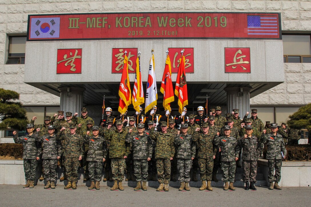 BARAN, Republic of Korea – Marines with III Marine Expeditionary Force, U.S. Marine Corps Forces Korea, and the Republic of Korea Marine Corps join in raising a fist in solidarity of the iron-clad alliance between the two nations and services. Lt. Gen. Eric Smith, commanding general of III MEF, Maj. Gen. Thomas Weidley, commanding general of First Marine Aircraft Wing, BGen. William Jurney, commander of Third Marine Division, and Maj. Gen. Patrick Hermesmann, commander of MARFORK, visited the R.O.K. Marine Corps Headquarters in Baran. (U.S. Marine Corps photo by Sgt. Nathaniel Hanscom)