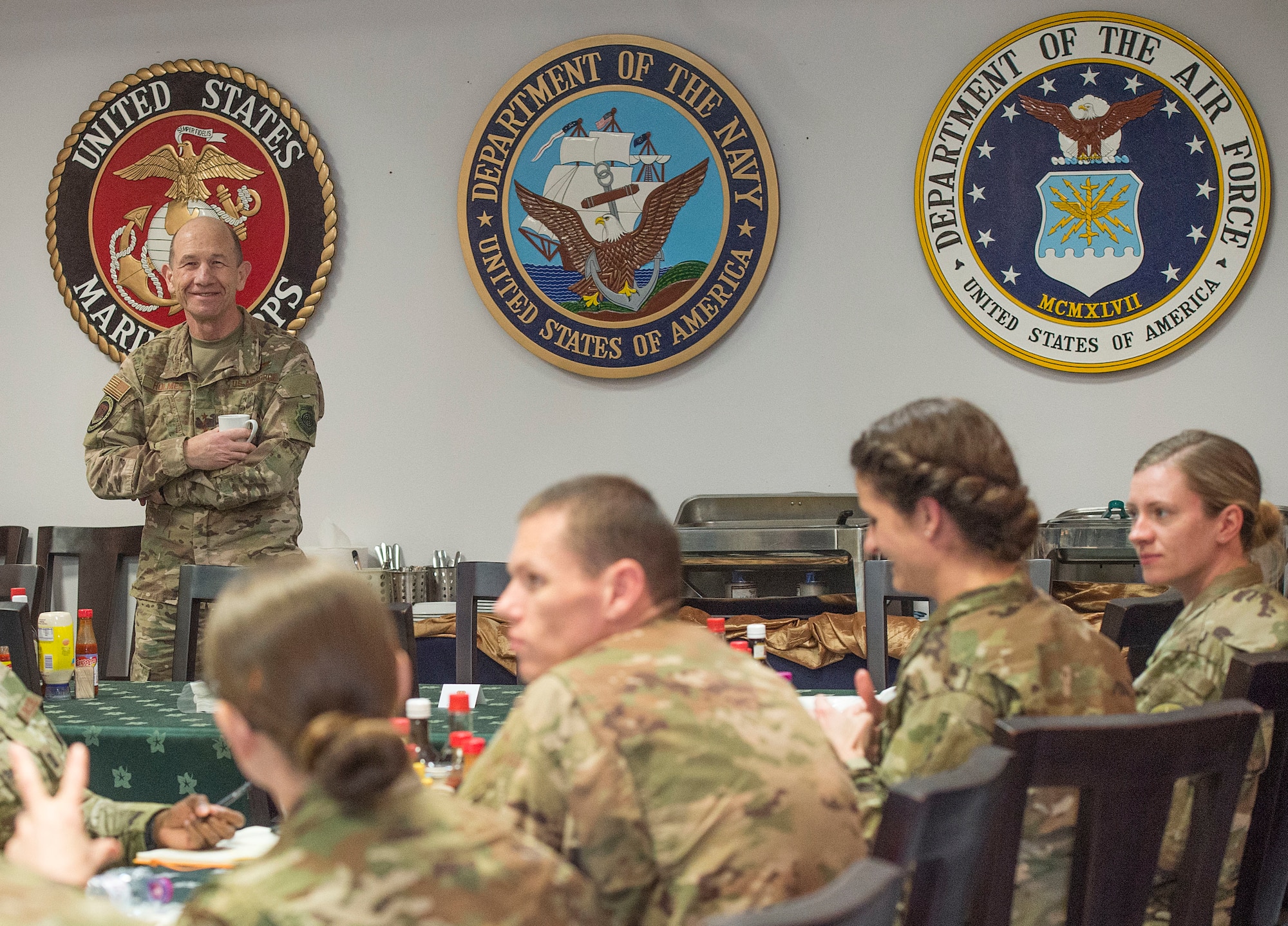 Gen. Mike Holmes, commander of Air Combat Command, shares his knowledge and experience with Airmen during an ACC leadership visit Feb. 11, 2019, at Al Udeid Air Base, Qatar.